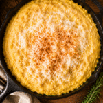 creamy corn polenta in a cast iron skillet