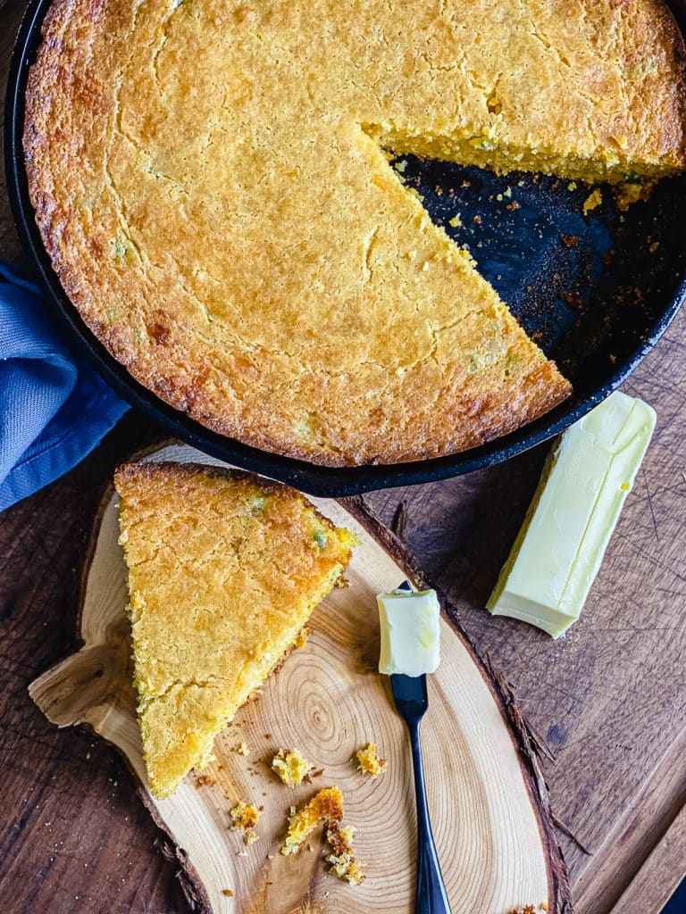 butter and cornbread on a wood table