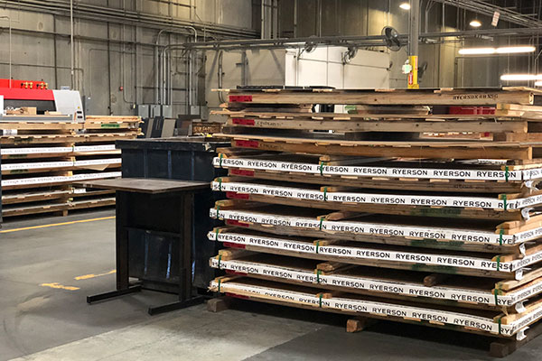 piles of stainless steel sheets at the Lynx grills factory