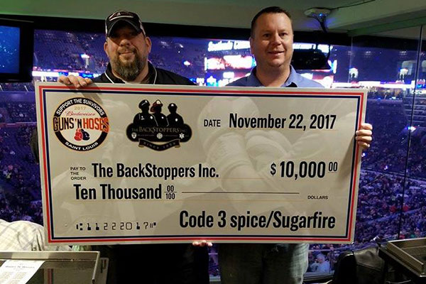 Founders of Code 3 Spices with Check for Backstoppers Charity