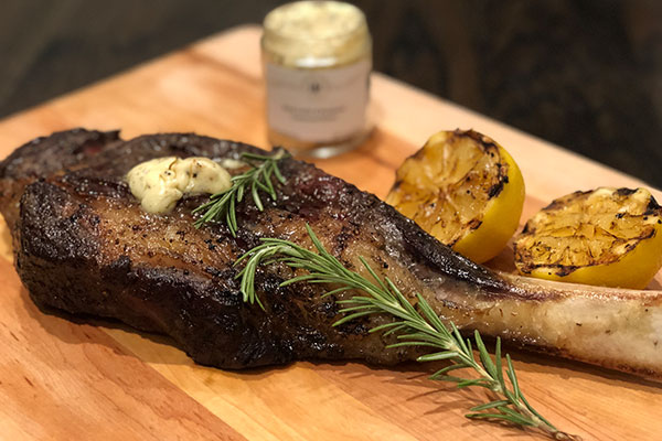 tomahawk steak resting before serving