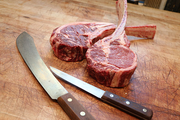 chuck eye steak with knives