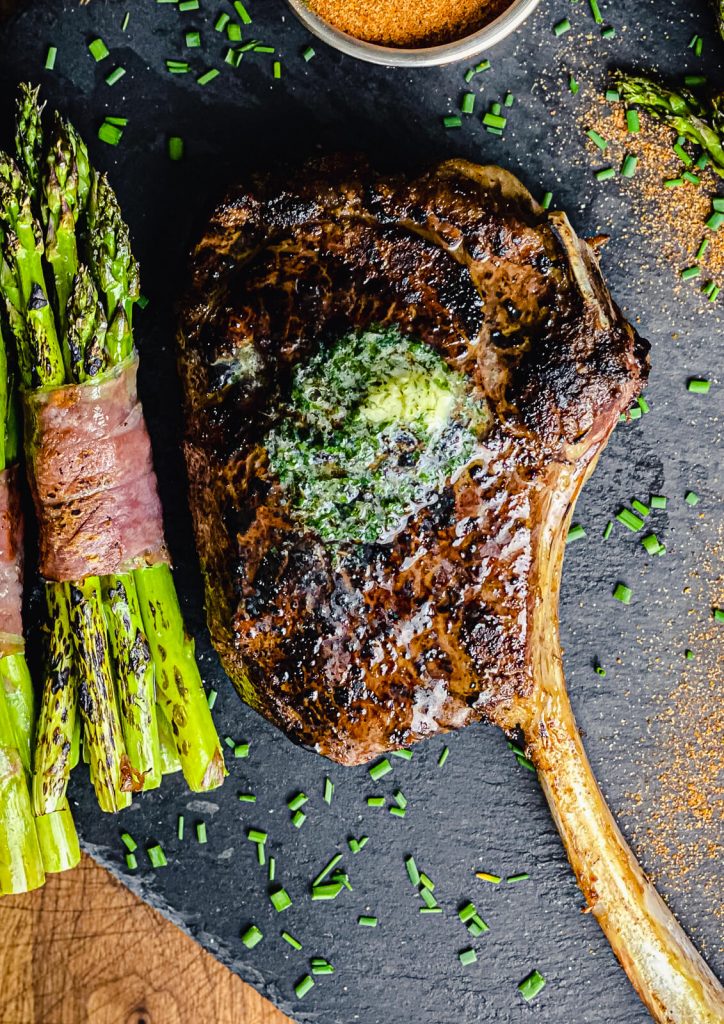 overhead view of seared tomahawk ribeye