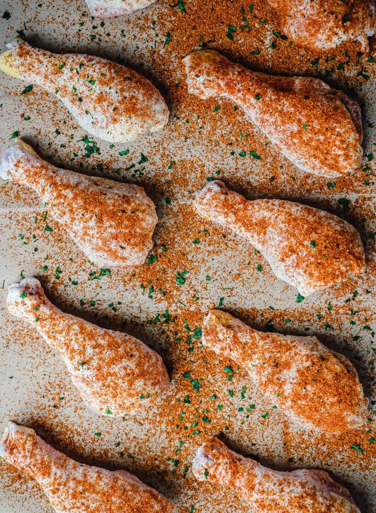 chicken legs seasoned and ready for the grill
