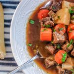 Finished beef stew with roll