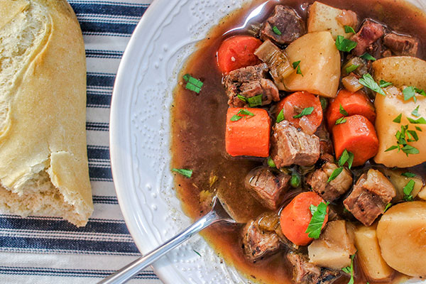 Finished beef stew with roll