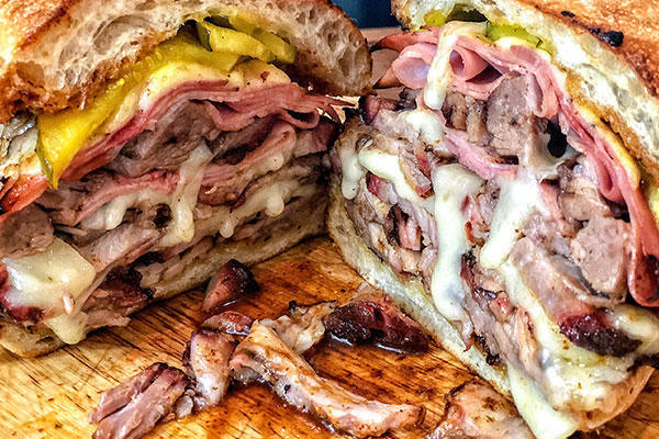 Cuban sandwich, sliced and ready to eat