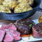 Filet mignon with crab stuffed mushroom caps