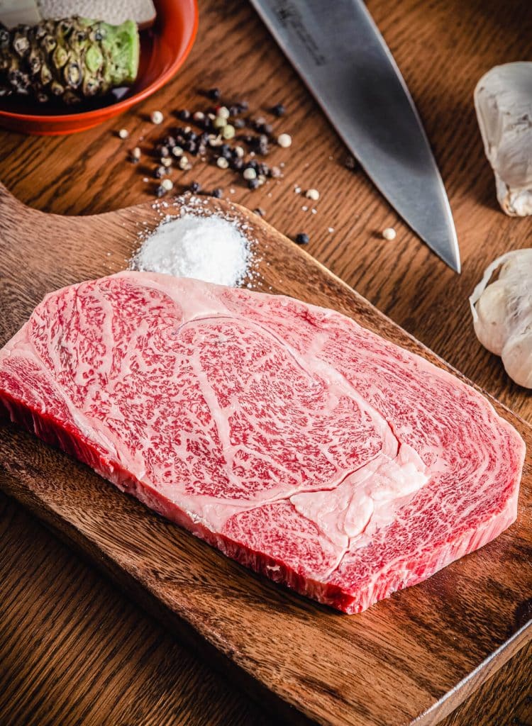 wagyu ribeye steak on a cutting board