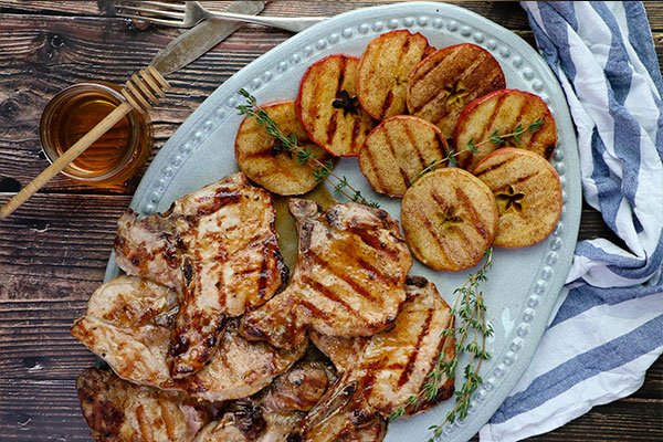 Glazed Grilled Pork Chops with Grilled Apples ready to serve