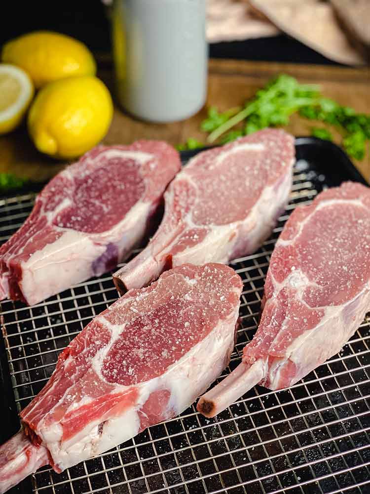 raw veal chops ready for the grill for the Veal Piccata recipe