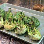 Spicy Grilled Baby Bok Choy with additional red pepper flakes for sprinkling