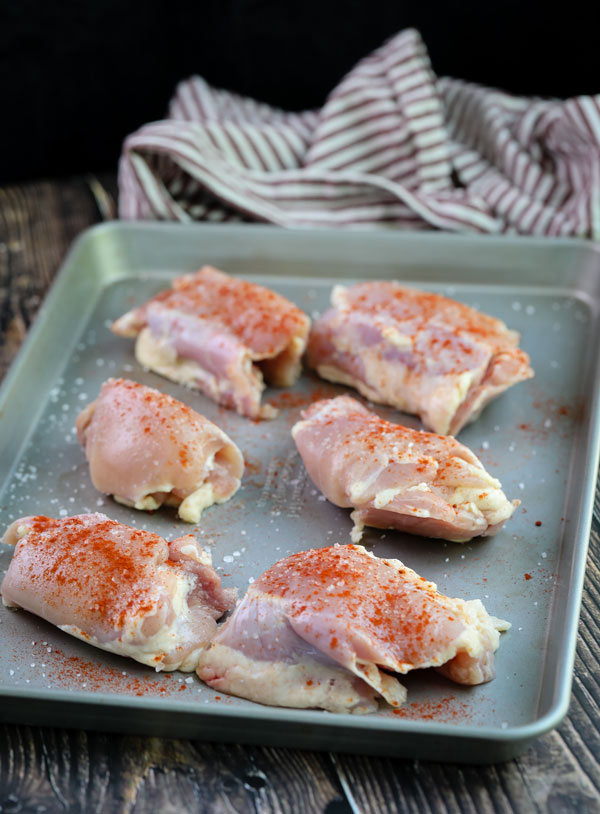 Seasoned skinless boneless chicken thighs for Grilled Honey Sriracha Chicken Thighs Recipe