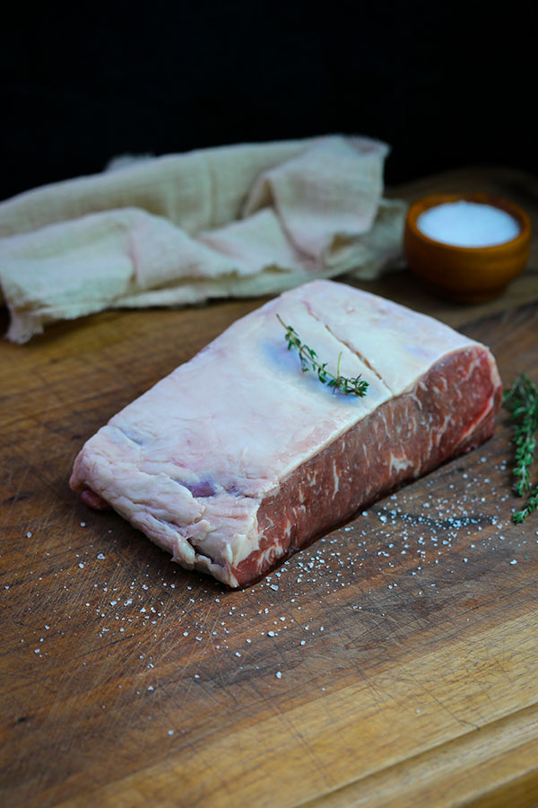 NY strip steak salted on both sides before sous vide bath