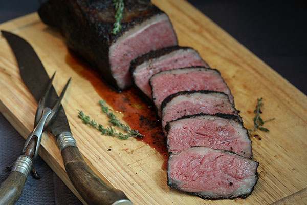 sous vide steak with compound herb butter ready to be served