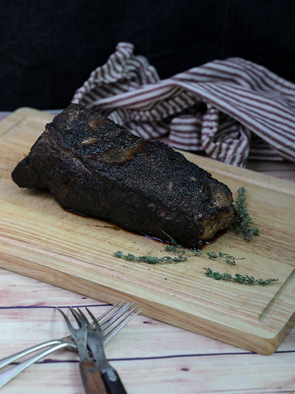 Sous vide steak with compound herb butter resting