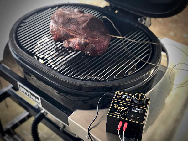 Pork Butt cooking with BBQube temperature control monitoring fan