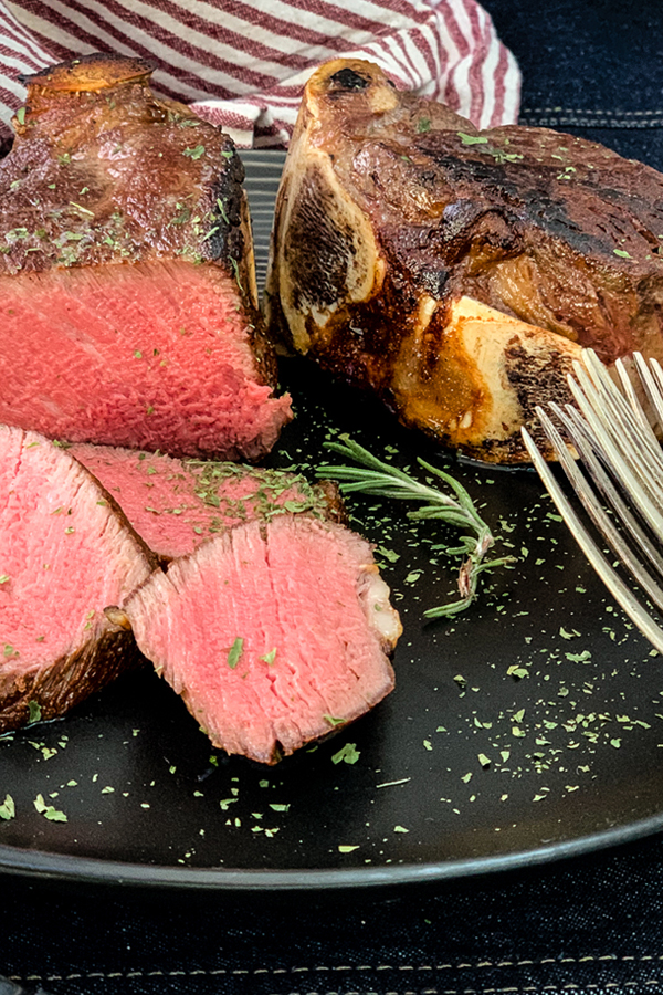 Bone-in Filet Mignon cooked and ready to serve