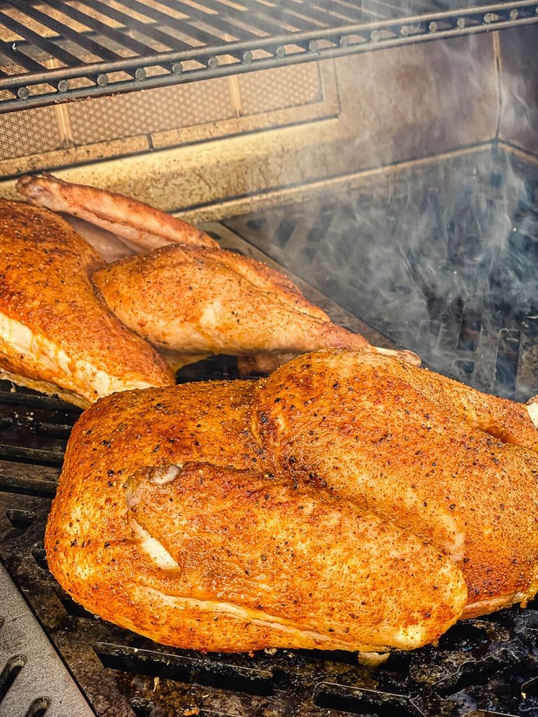 turkey halves on a grill