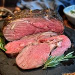 smoked and seared prime rib sliced and ready to serve