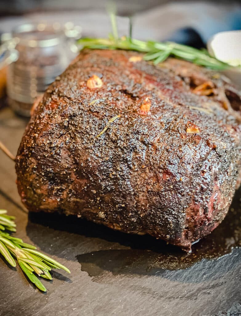 prime rib resting on a cutting board