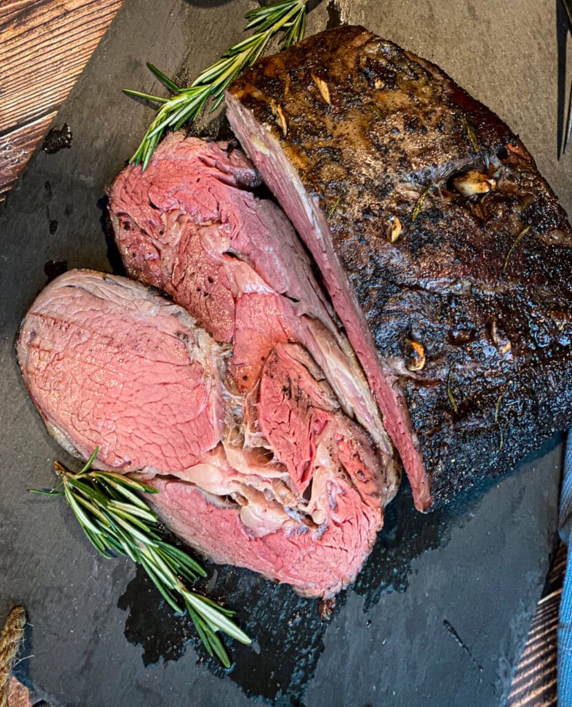 overhead view of a sliced smoked prime rib