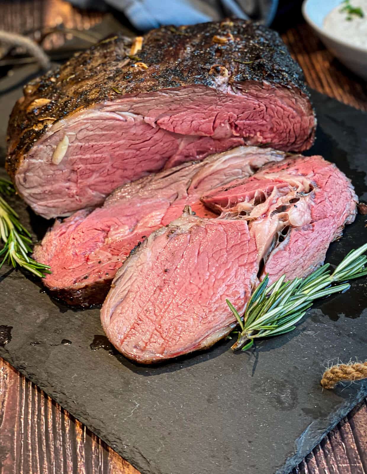 sliced smoked prime rib with rosemary