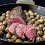 Omaha Steaks chateaubriand sliced over roasted potatoes