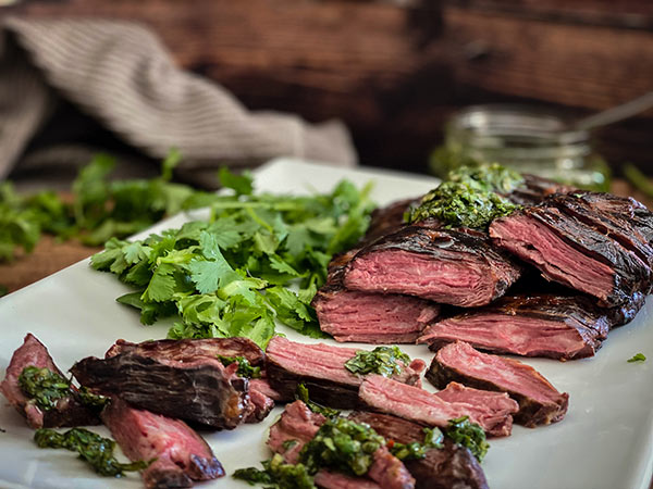 Sliced skirt steak with fresh herbs