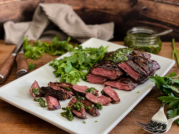 Sliced skirt steak with fresh herbs