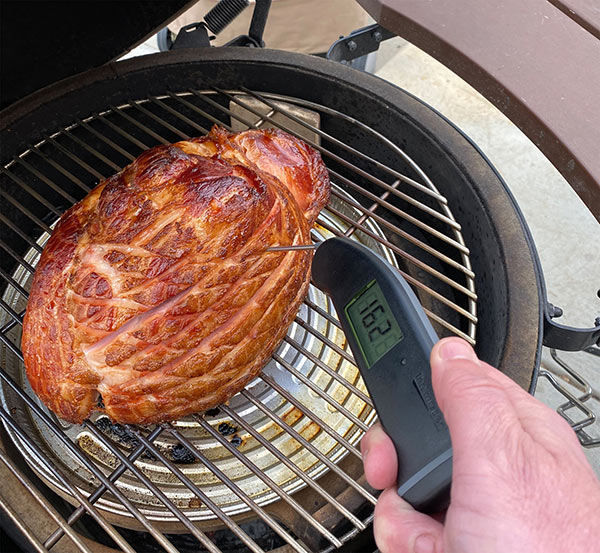 ThermoWorks Thermapen MK4 checking the temperature on a ham