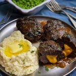 Grilled Cheese Stuffed Salisbury Steak plated and ready to eat