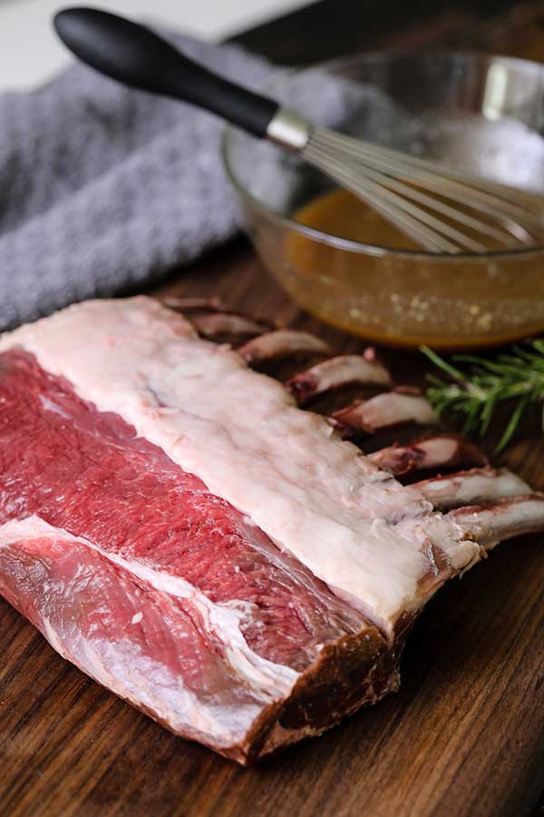 Raw lamb with marinade for Maple Dijon Lamb recipe