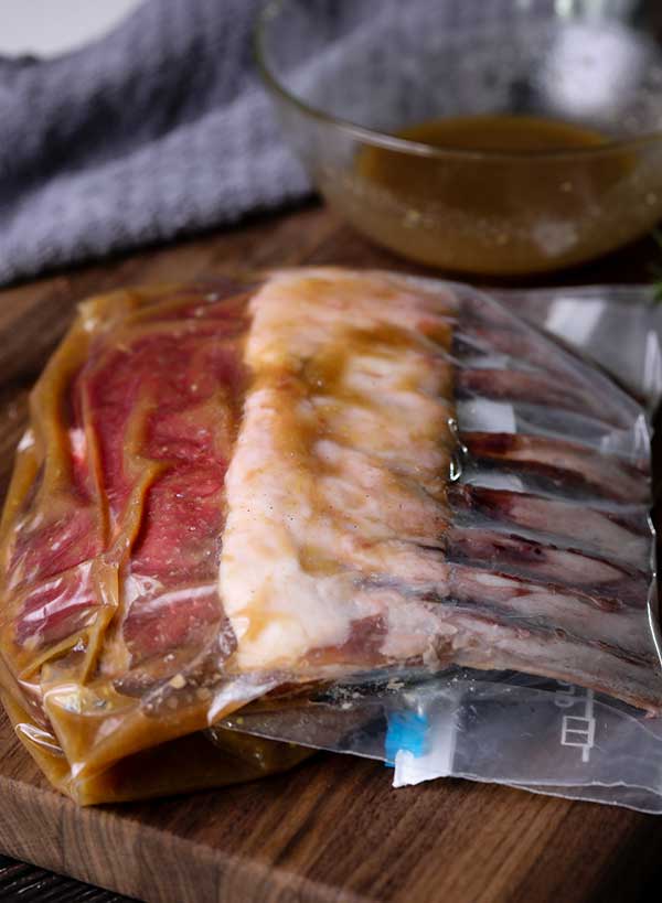 Rack of lamb in sous vide bag with marinade