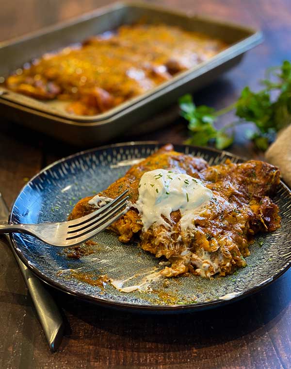 Smoked chicken and cheese enchiladas with sour cream