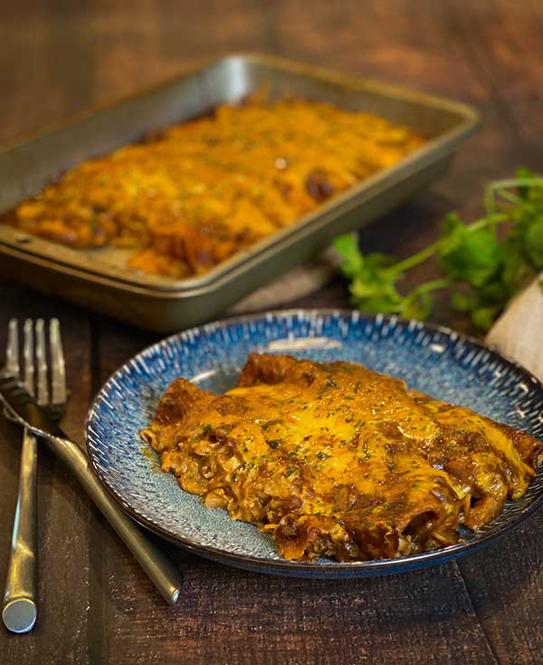 Smoked chicken and cheese enchiladas plated