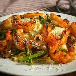 Grilled Argentinian Shrimp with Fettuccine Alfredo plated and ready to serve