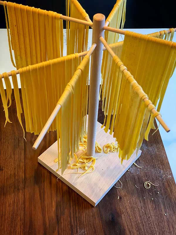 handmade pasta drying for Grilled Argentinian Shrimp with Fettuccine Alfredo