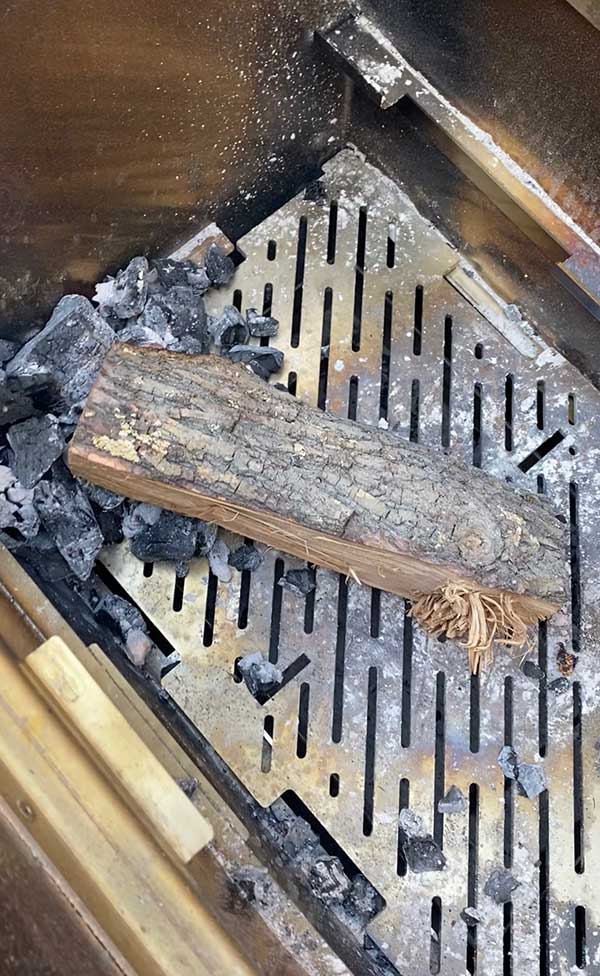 Coal and wood starter in the Kalamazoo Shokunin Grill