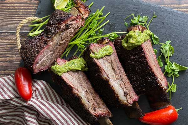 Beef ribs with Avocado Cilantro and Lime Vinaigrette ready to serve