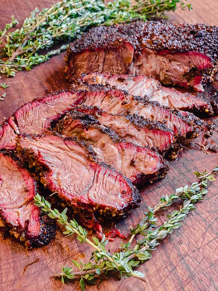 image of sliced smoked beef chuck roast ready to serve