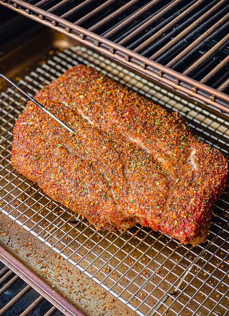 beef chuck roast cooking on a smoker