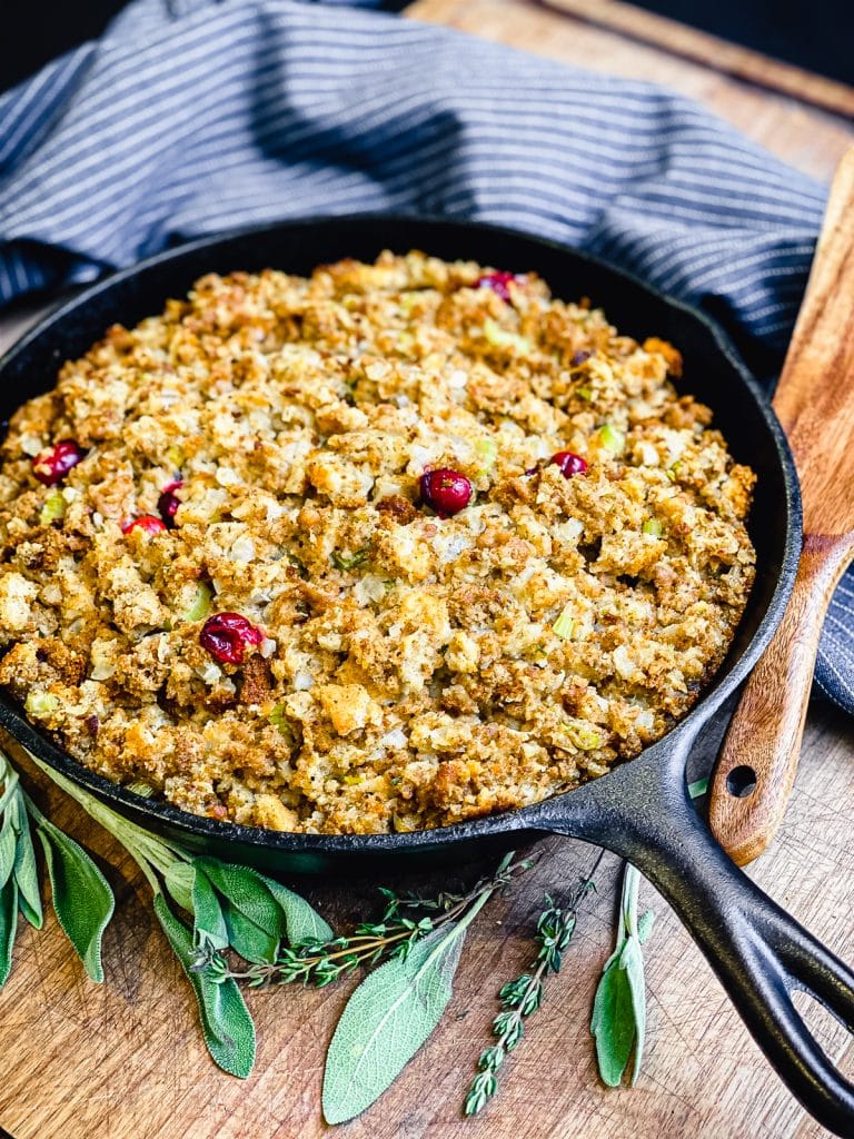 cranberry sausage stuffing in a cast iron pan