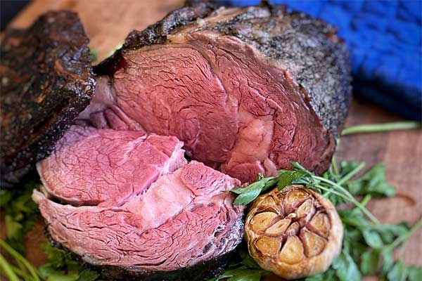 Bone-In Prime Rib from Omaha Steaks sliced and ready to serve