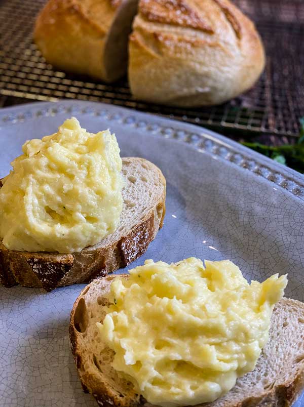 Mashed potatoes layered on bread for open-faced hot beef sandwich 