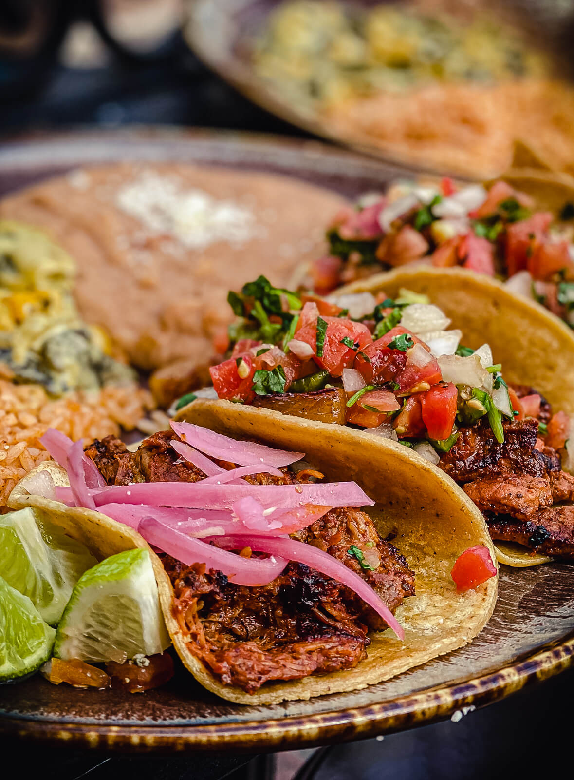 Carnitas street taco with pickled red onions