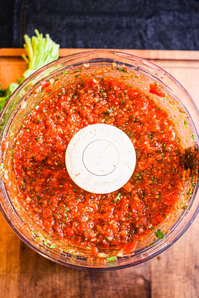 restaurant style salsa blended up in a food processor from overhead