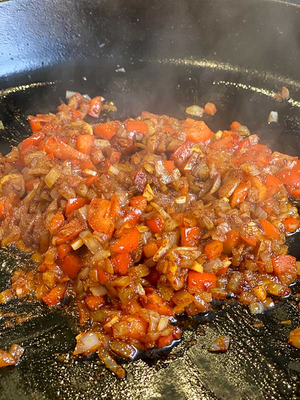 Hungarian Paprika, flour, and sauteed red peppers and onion for Pan-fried Smoked Chicken Paprikash