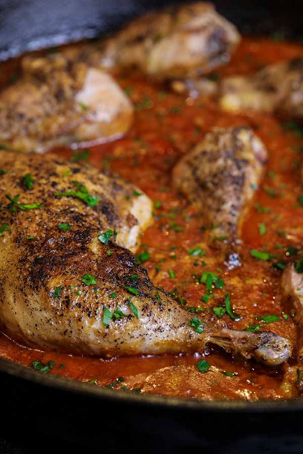 Seared chicken and paprika onions and red peppers for Pan-fried Smoked Chicken Paprikash