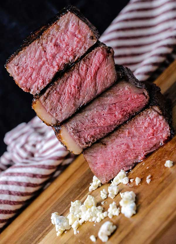 reverse sear results in uniformly cooked steak that is pink in the middle and seared on the outside